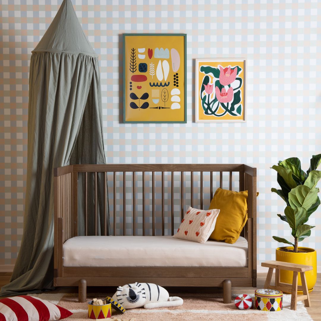 This 4-in-1 Convertible Crib, Bassinet, And Toddler Bed Grows With Your